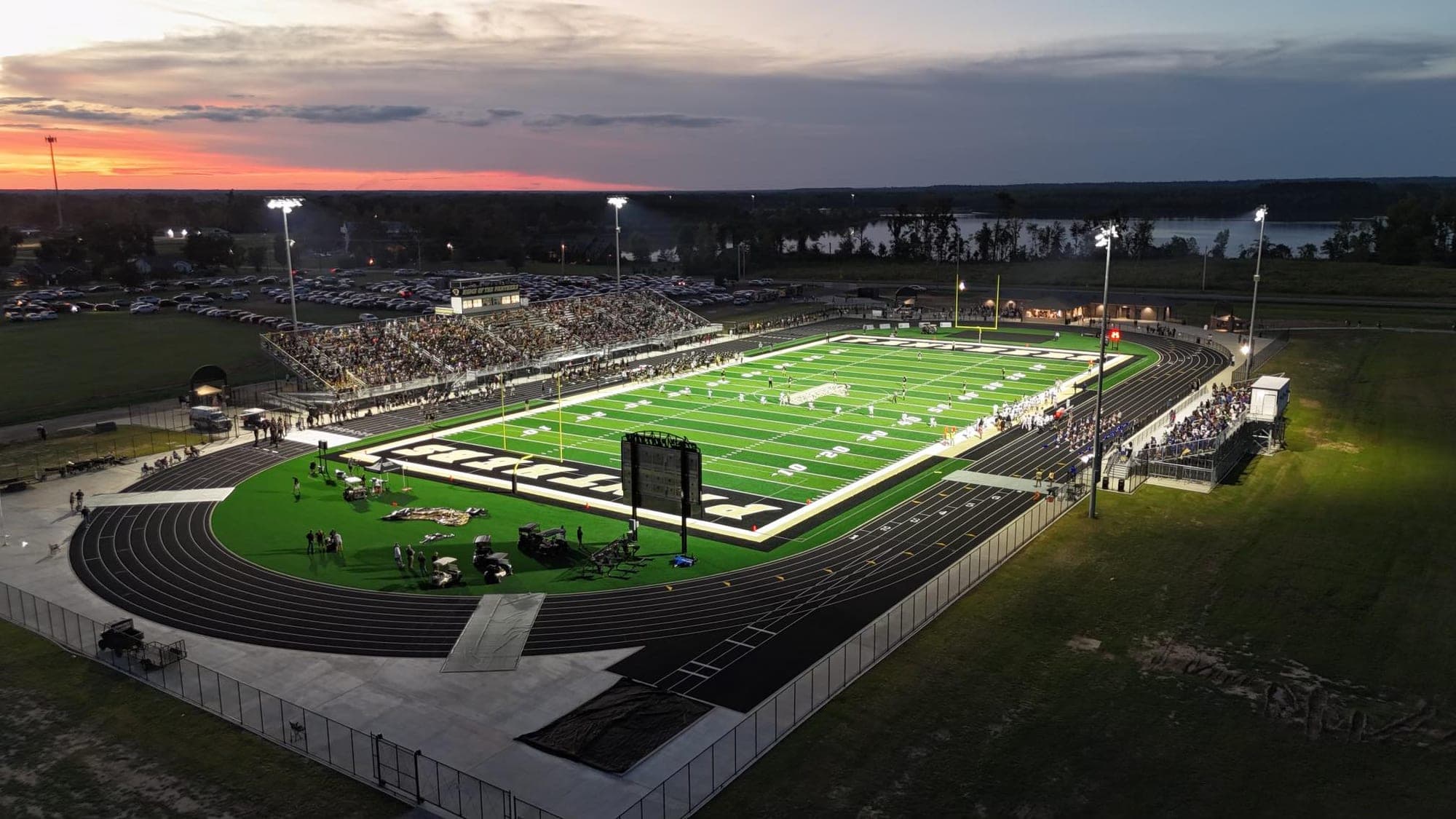 North Mississippi high-school stadium at dusk before kickoff